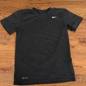 The Nike Tee - Dri-fit. Size men’s small. Black. Excellent pre-owned condition.